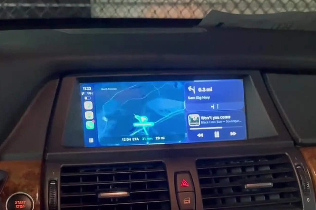 The same original BMW display in the 2013 BMW X5, now showing Apple CarPlay